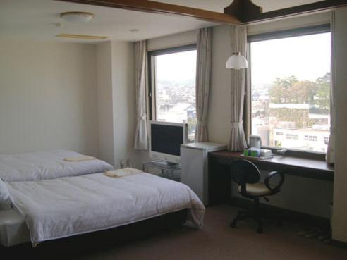 Shimabara Station Hotel Kamer foto