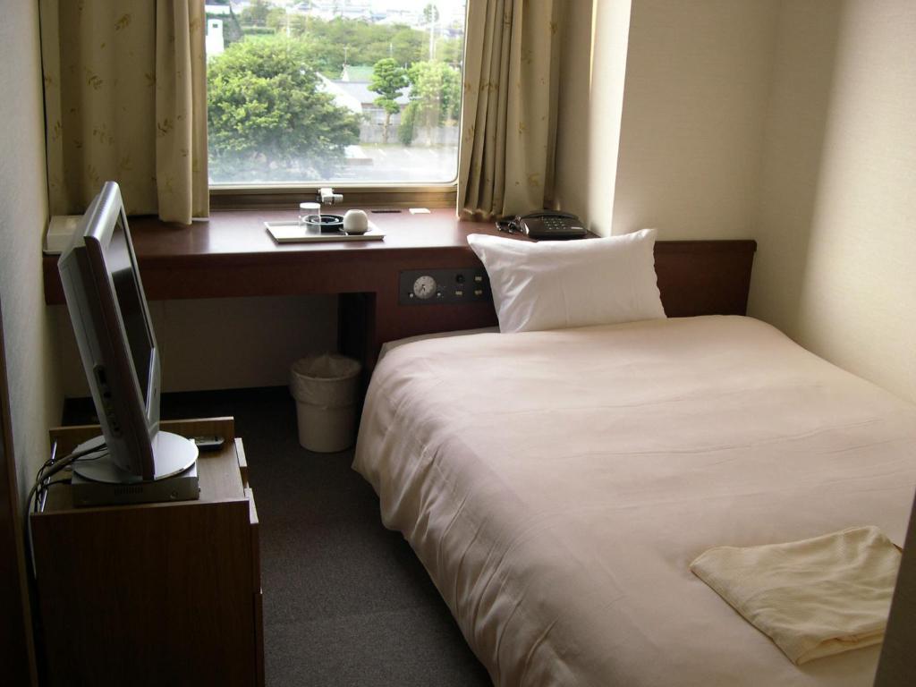 Shimabara Station Hotel Kamer foto